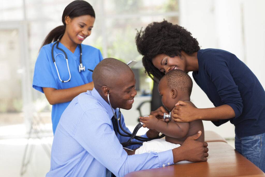 doctor examining a child in a hospital-pediatrican