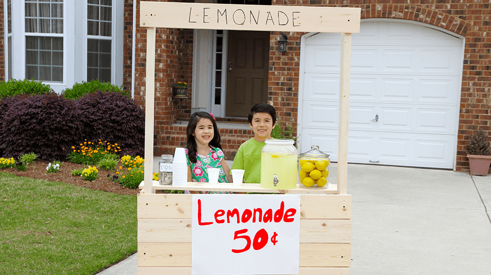 child business lemonade stand of siblings