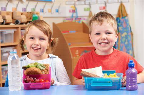 happy kids with nutritious lunches