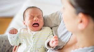 newborn baby is fussy