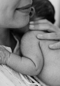 newborn baby spit milk