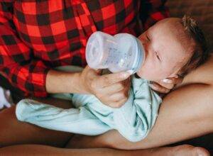 newborn baby spit milk